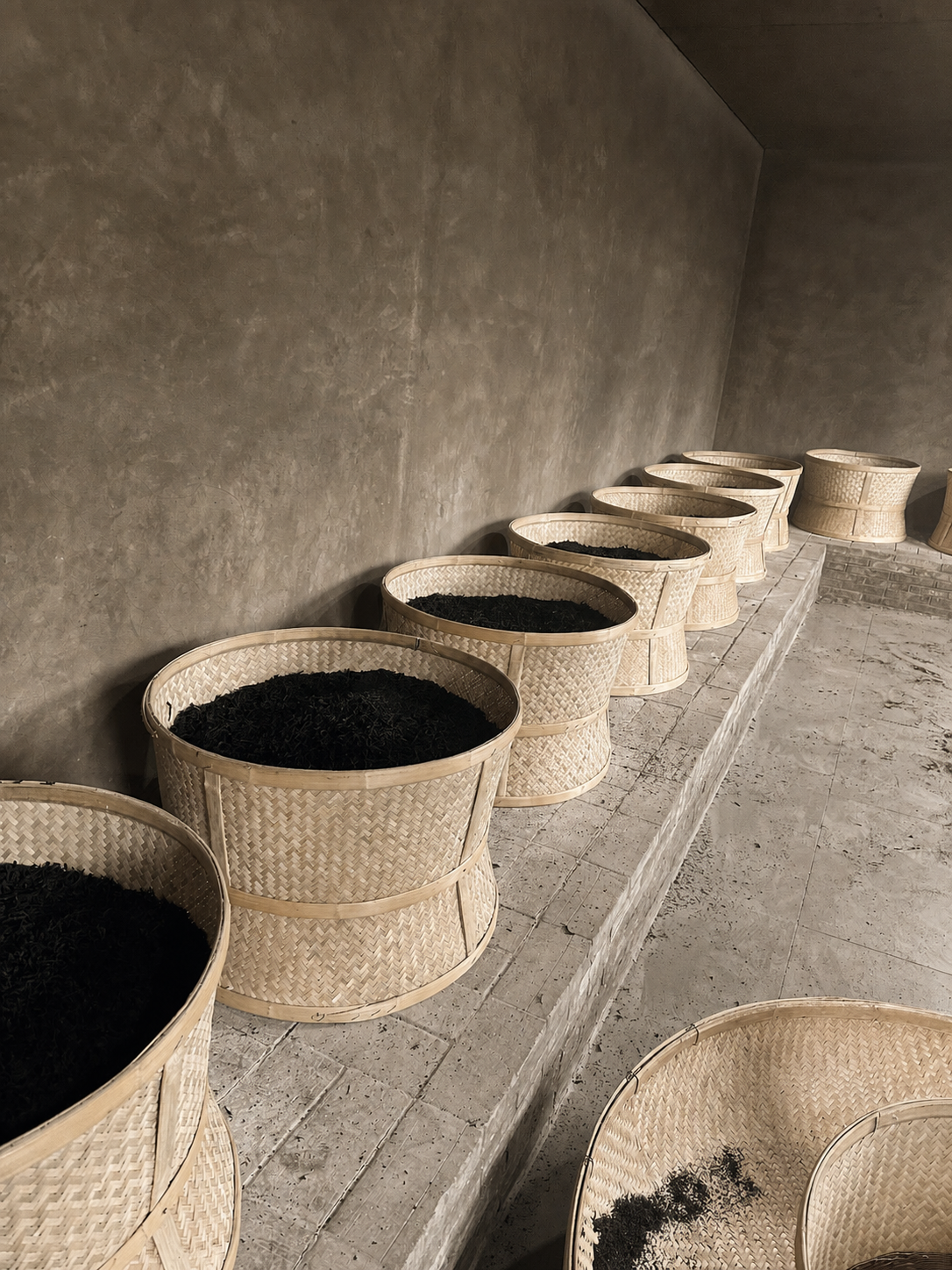 Finished tea resting in woven baskets