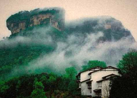 A farmhouse under the cliffs